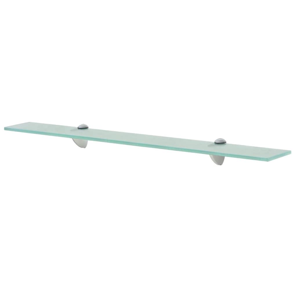 Étagère murale en verre transparent avec deux supports, installée au-dessus d’une vasque de salle de bain.