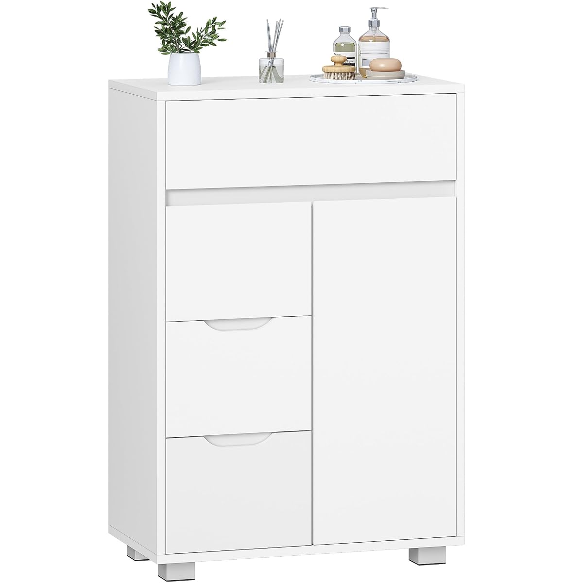 Armoire basse blanche avec quatre tiroirs et une porte dans une salle de bain lumineuse