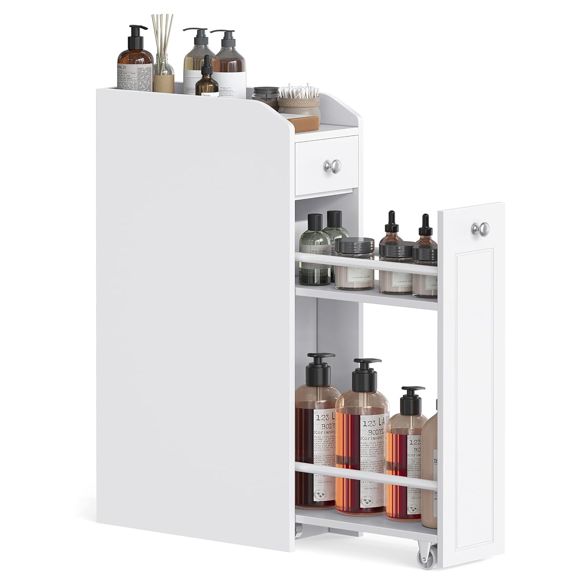 Armoire basse blanche à deux tiroirs, placée dans une salle de bain claire près d’une vasque en pierre.