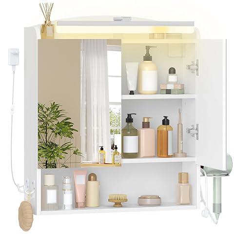 Armoire murale blanche avec deux portes miroir et éclairage LED au-dessus d’une vasque claire.